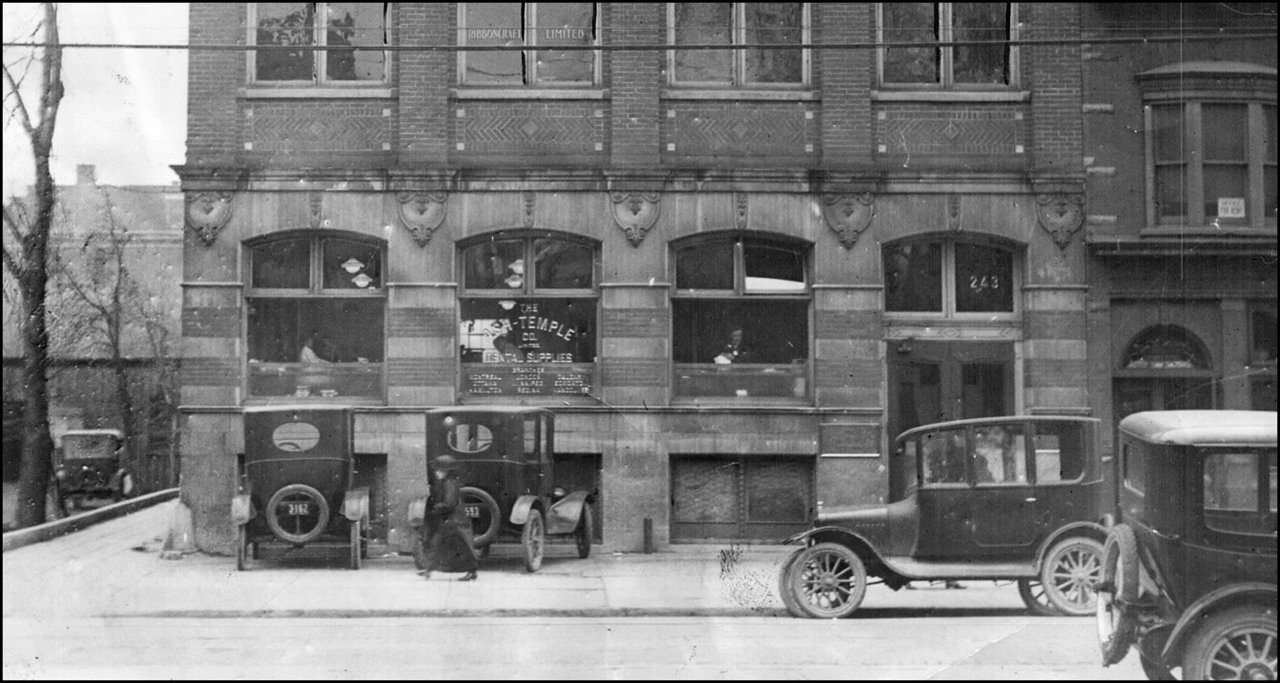 Autos in 1923 at the R.G.Long Building on King St. TPL.jpg