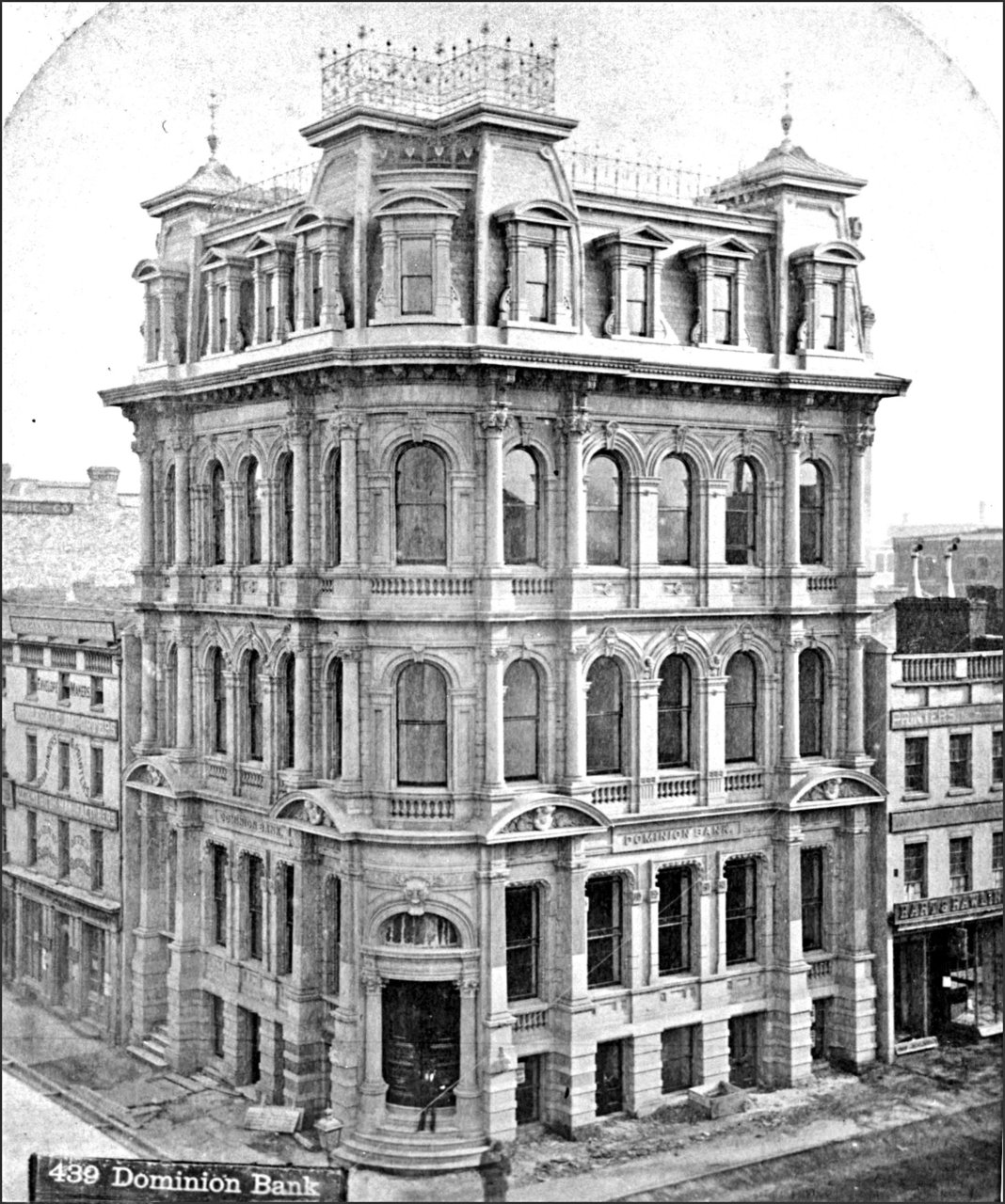 Dominion Bank, King St. W., S-W corner Yonge St. (1879-1913)   1879   TPL.jpg
