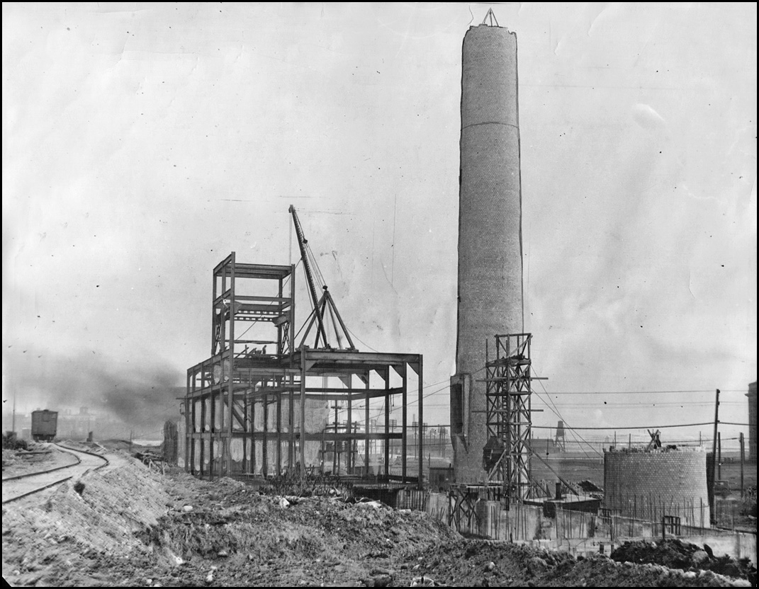 Giant heating plant under construction for the huge ovens and boilers that will supply the Uni...jpg