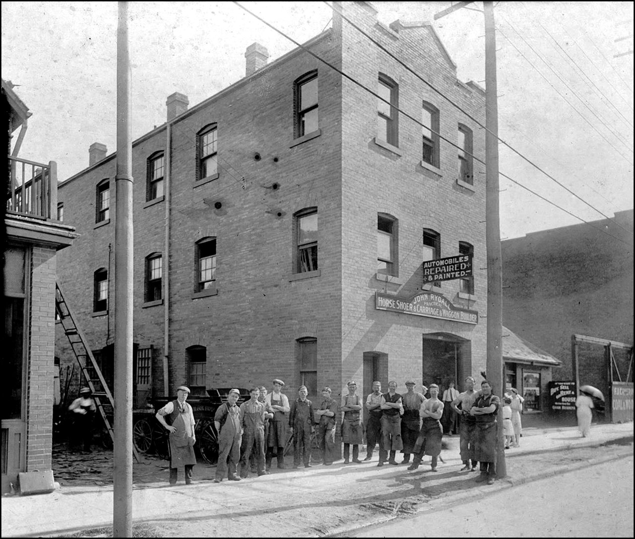 John Rydall blacksmith & carriage builder, Bloor St. W., S-W corner Croft St.   1915   TPL.jpg