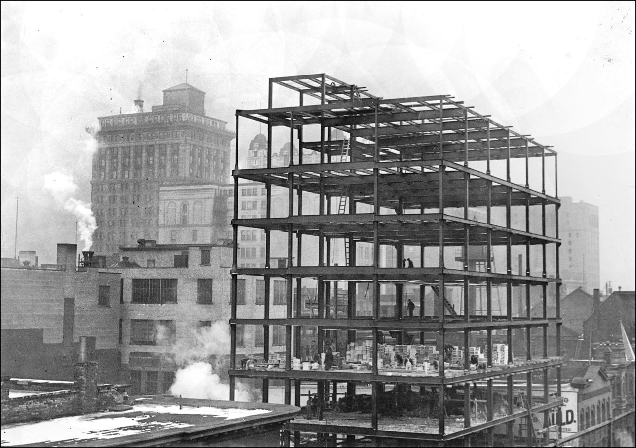 Looking N-E towards Reford Building under construction, Bay St., N-E corner Wellington St. W. ...jpg