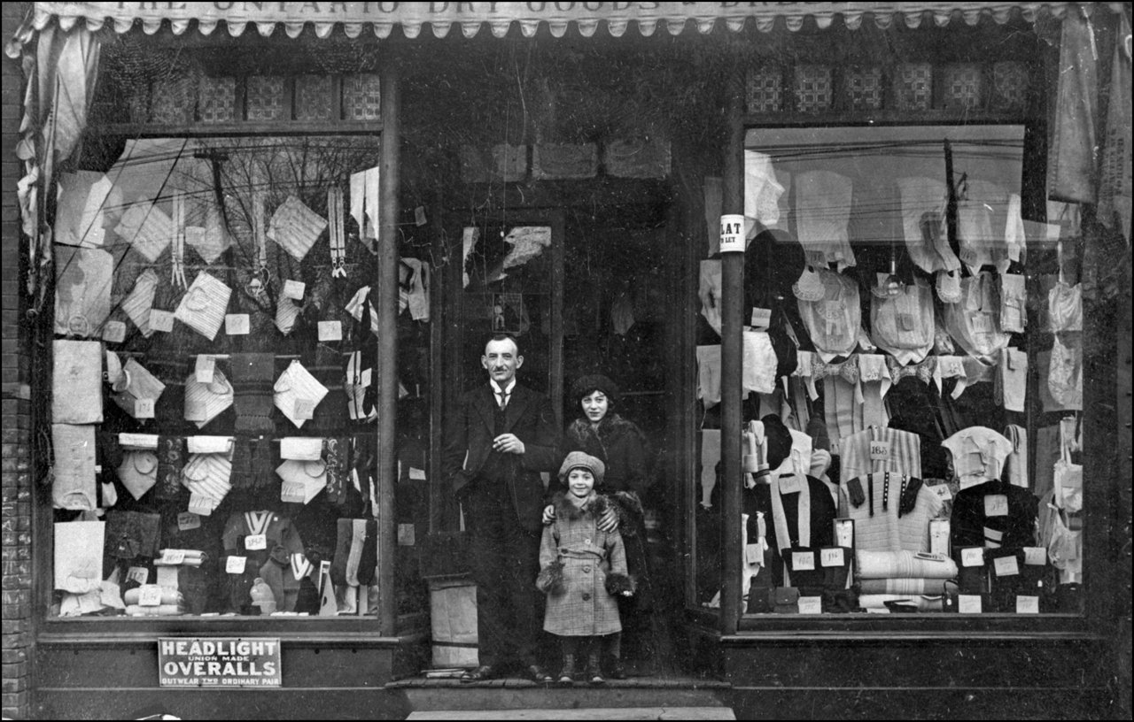 Morris Melamed, proprietor-Ontario Dry Goods & Dresses Co. at his Spadina Street shop with his...jpg