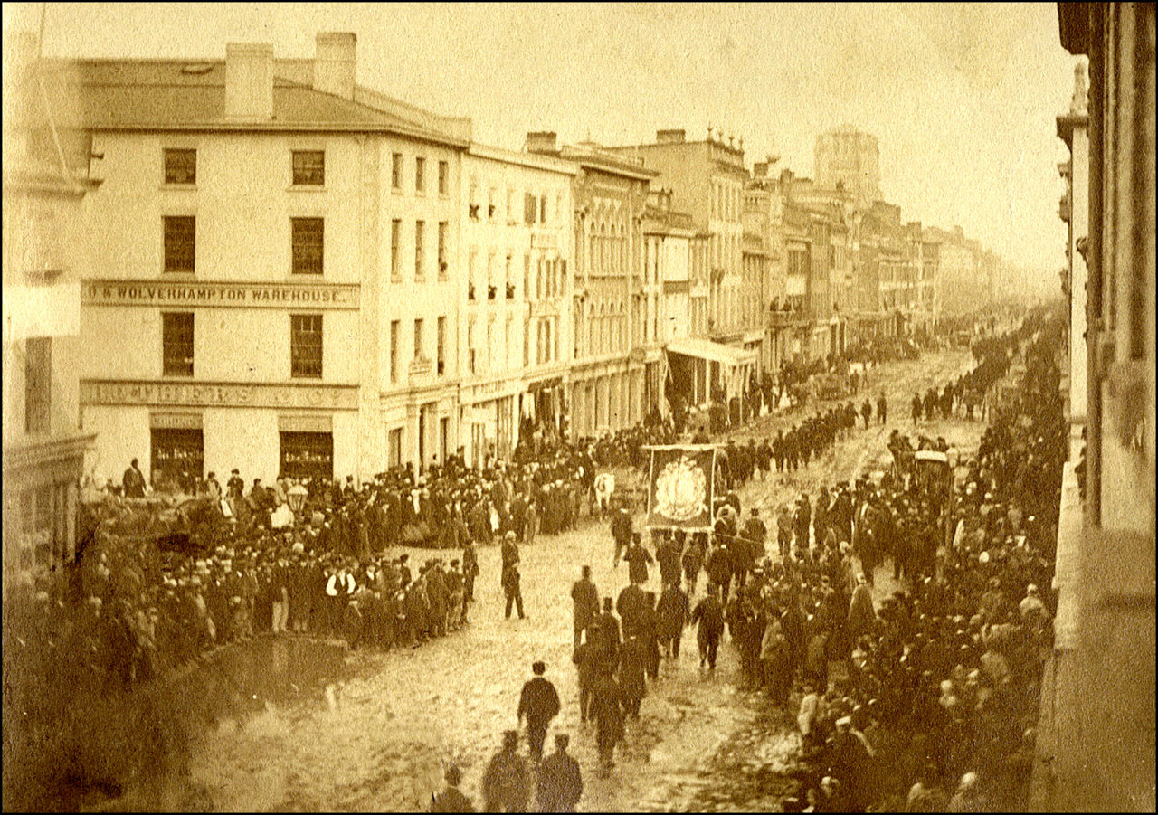 Orange Parade  King St. E. looking e. from w. of Yonge St. c.1867 TPL.jpg