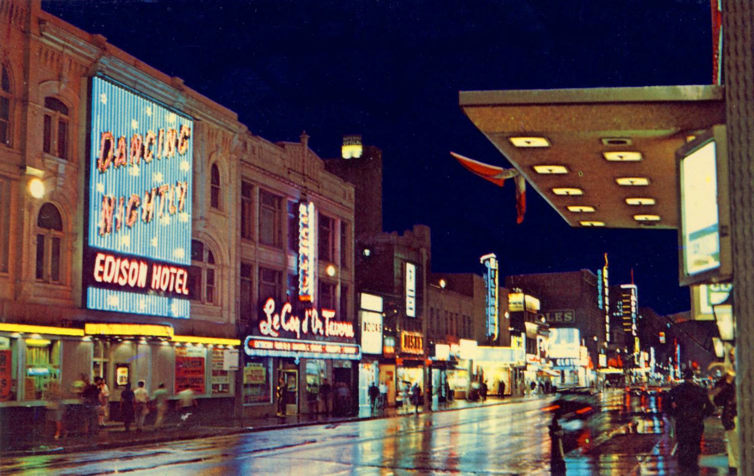 postcard-toronto-yonge-street-night-looking-s-across-from-edison-hotel-many-signs-1960s.jpg
