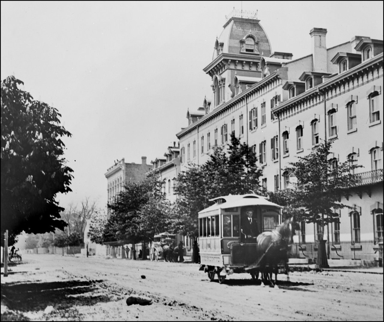 Queen's Hotel, Front St. W., north side, between Bay & York Sts. 1886   TPL.jpg