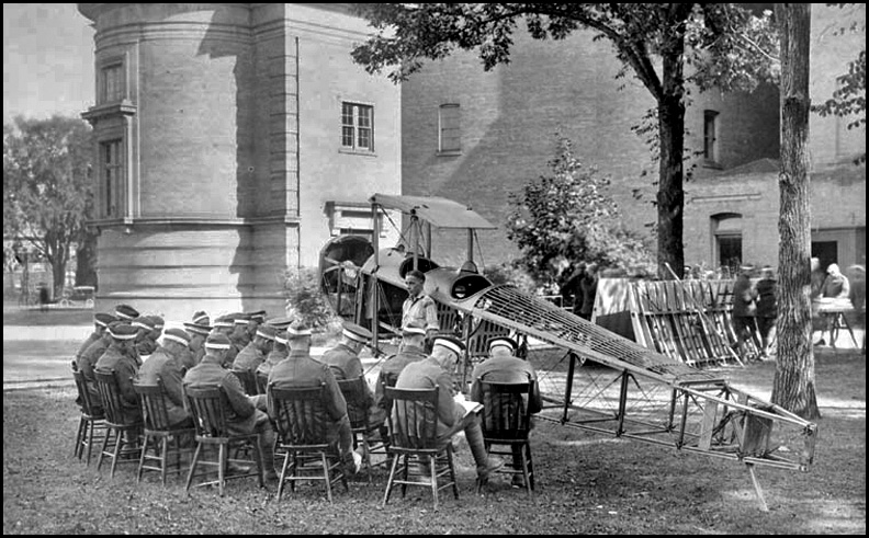 School of Aeronautics-U. of T. studying Curtiss J.N.-4 fuselage 1917.jpg