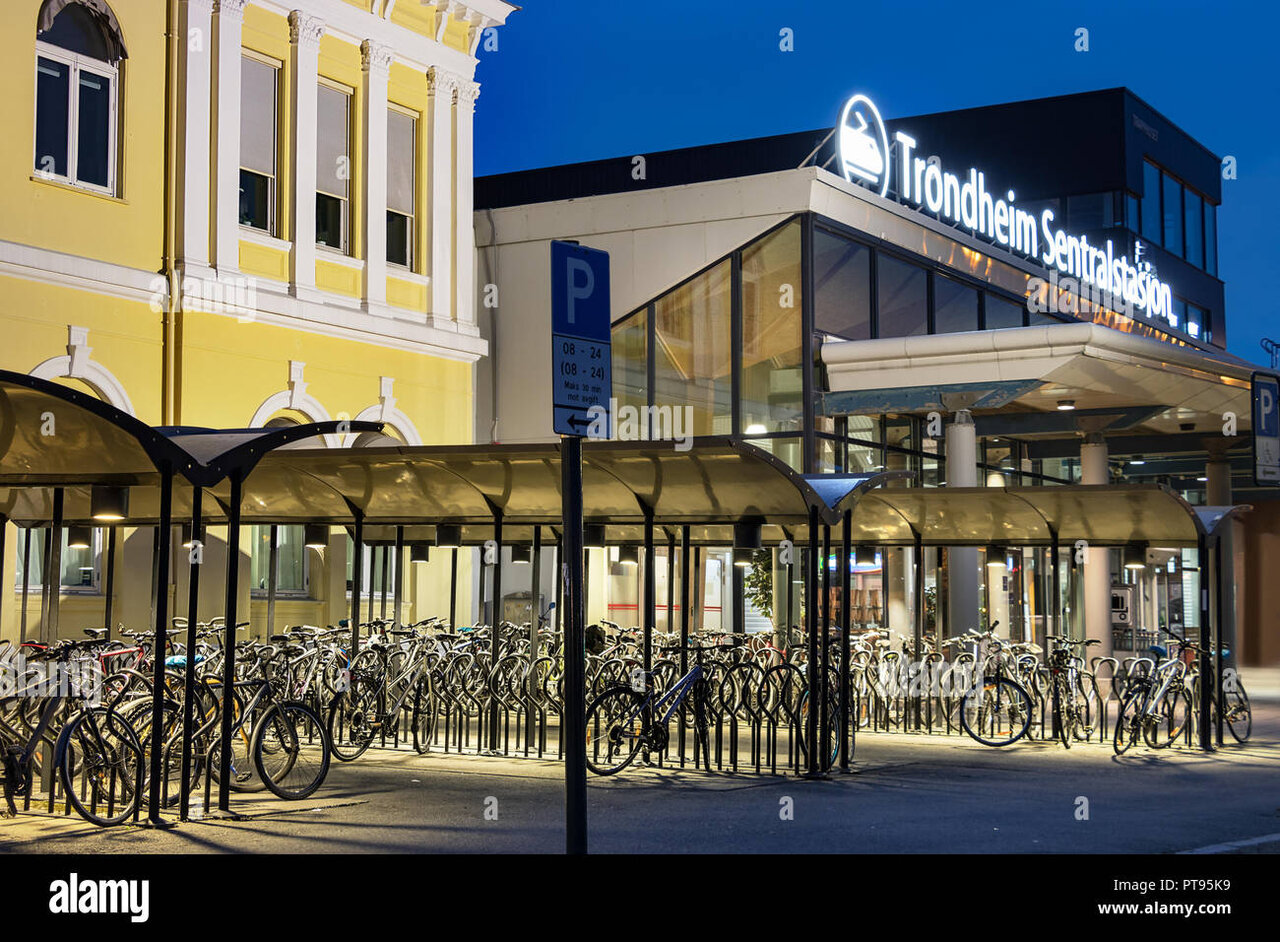 view-of-the-bikes-parked-next-to-the-main-entrance-of-the-trondheim-central-train-station-in-...jpeg