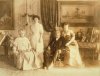 Clark Family; Sir William Mortimer Clark, Lady Clark and their two daughters in the drawing room.jpg