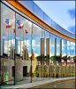 flags reflected at Scarb  Civic Cent.jpg