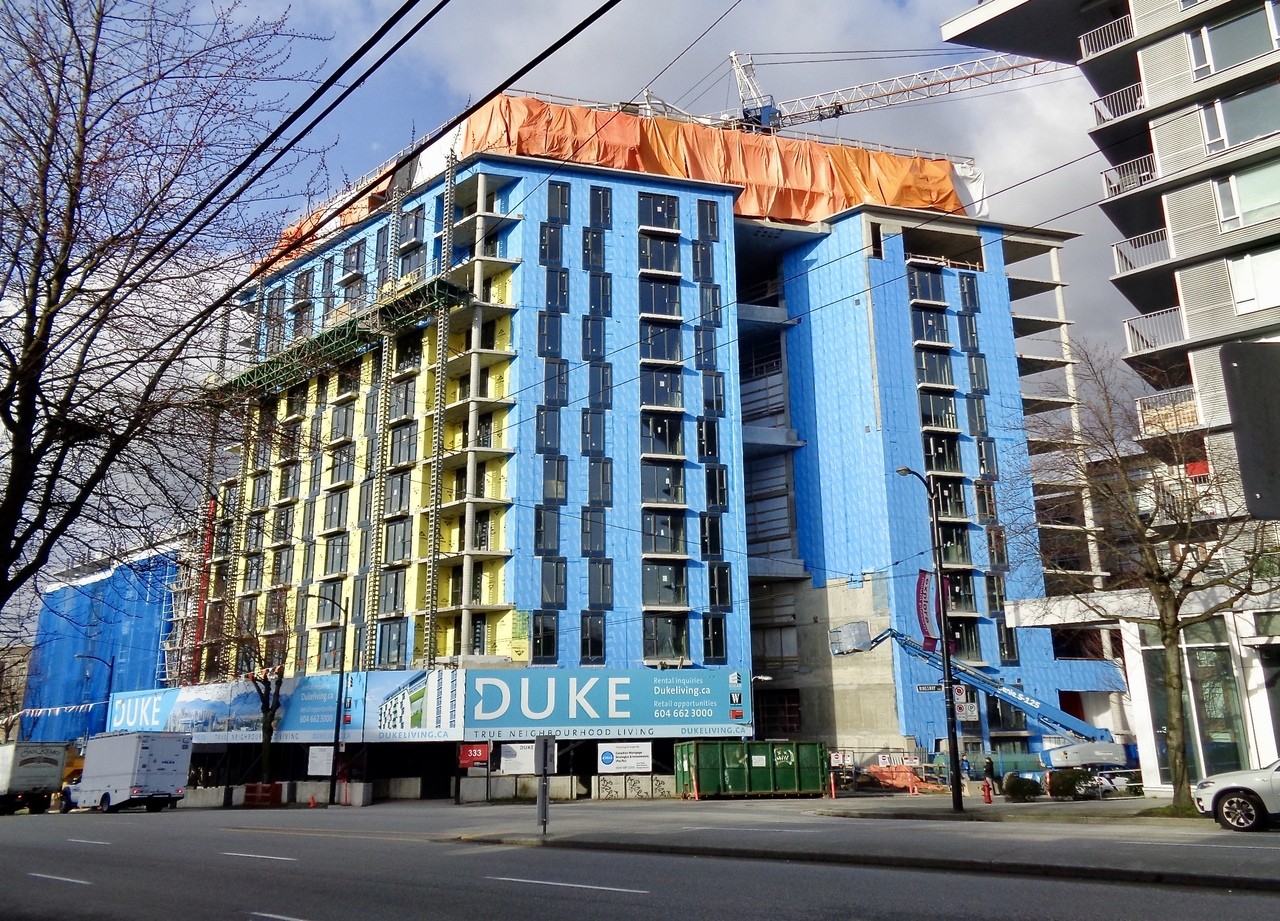 Glazing Work Underway at ToppedOff Duke Rental Apartments in Mount