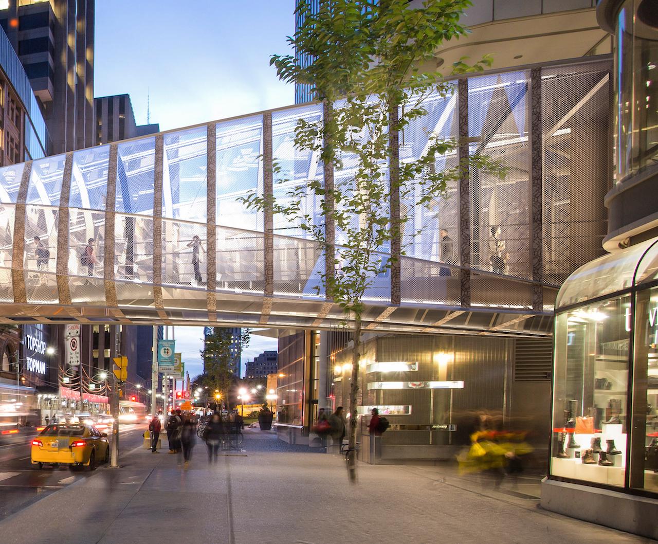 Pedestrian bridge installed at Toronto Eaton Centre - constructconnect.com