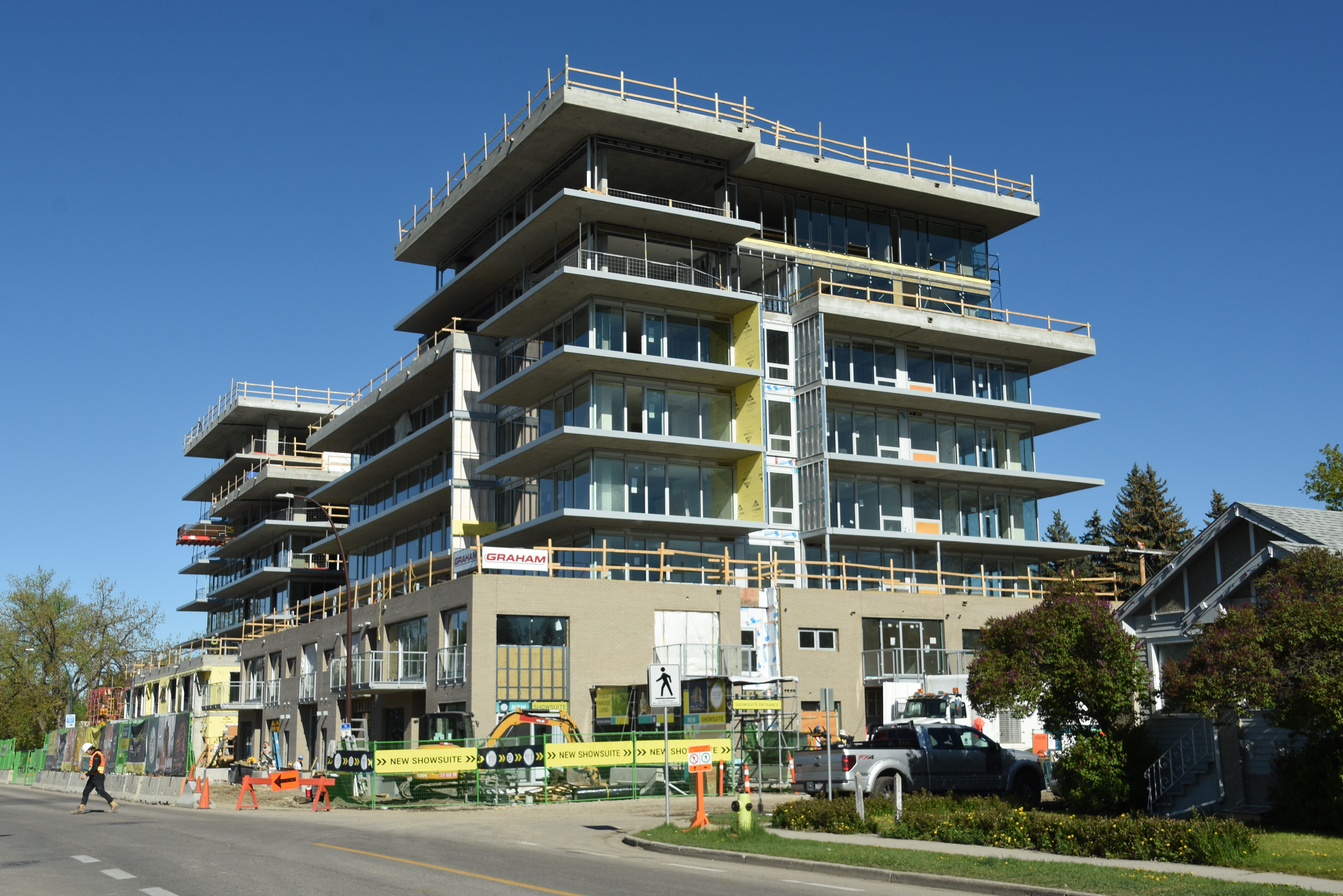 Glass Work Shapes Ezra on Riley Park SkyriseCalgary