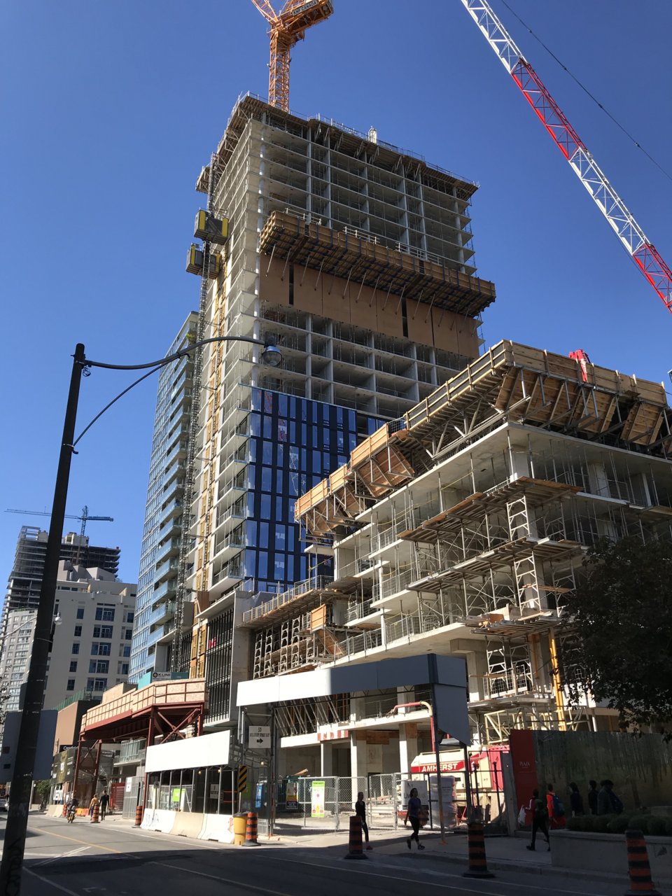 Neighbouring Condos Ascending into Church-Wellesley Skyline | UrbanToronto