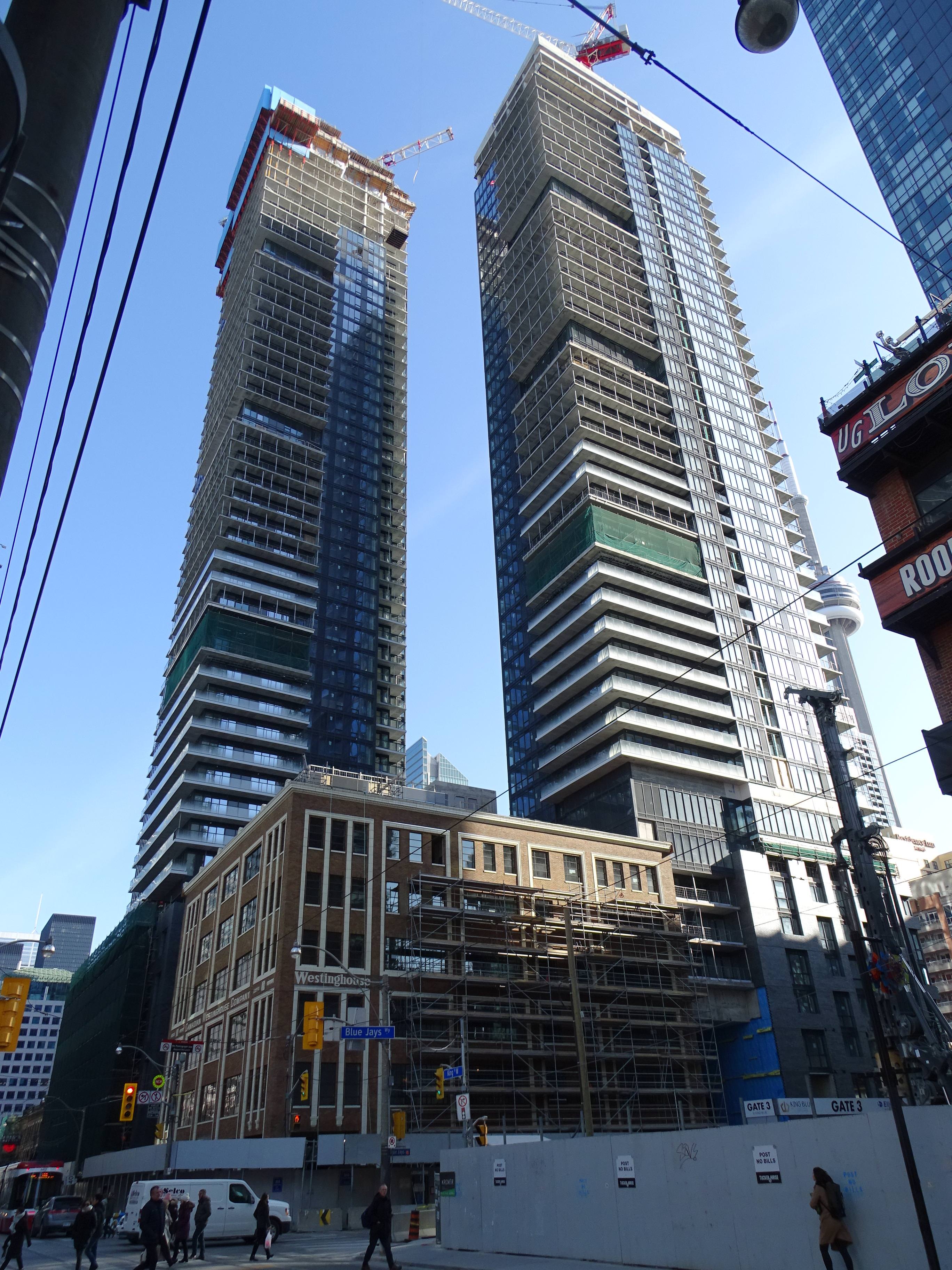 West Tower Topped Off, East Tower Close at King Blue Condos | UrbanToronto