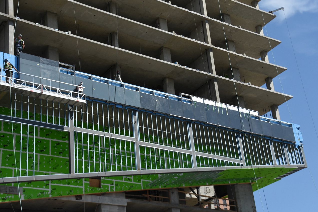 Cladding Installation Begins at West Village Towers | SkyriseCalgary