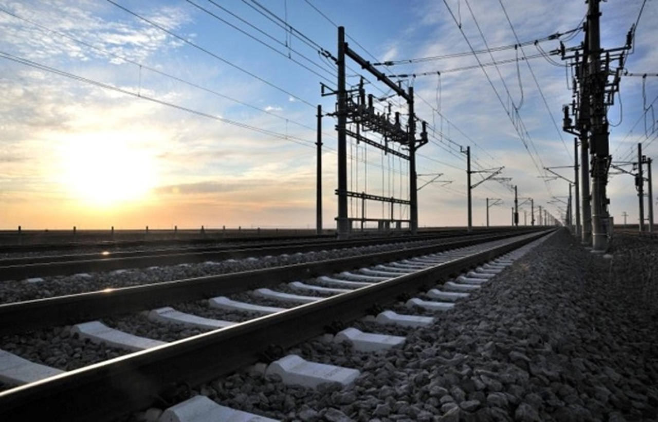 Photo of electric lines above railway tracks