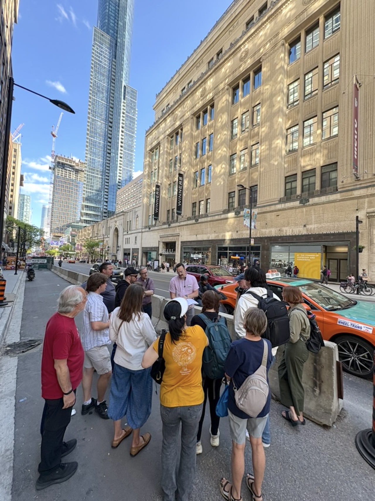 Council on Vertical Urbanism and UrbanToronto walking tour group near College Park in Toronto